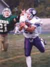 photo of a football player scoring a touchdown